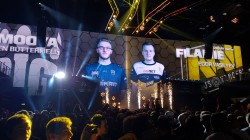 Pre-match graphics shown to the crowd before the game started. The player portraits are Owen "Smooya" Butterfield from BIG and Egor "Flamie" Vasilyev from Natus Vincere. The picture was taken from the general seating area in the stadium.