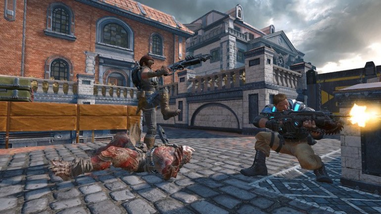 An in-game screenshot of Kait performing a curb stomp on an enemy Swarm character, with JD firing a lancer in the corner.