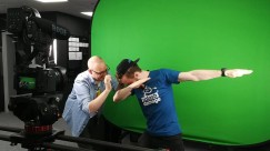 Posing - A picture of Luc Shelton (myself) posing or "dabbing" in front of a green screen for the media and marketing team.